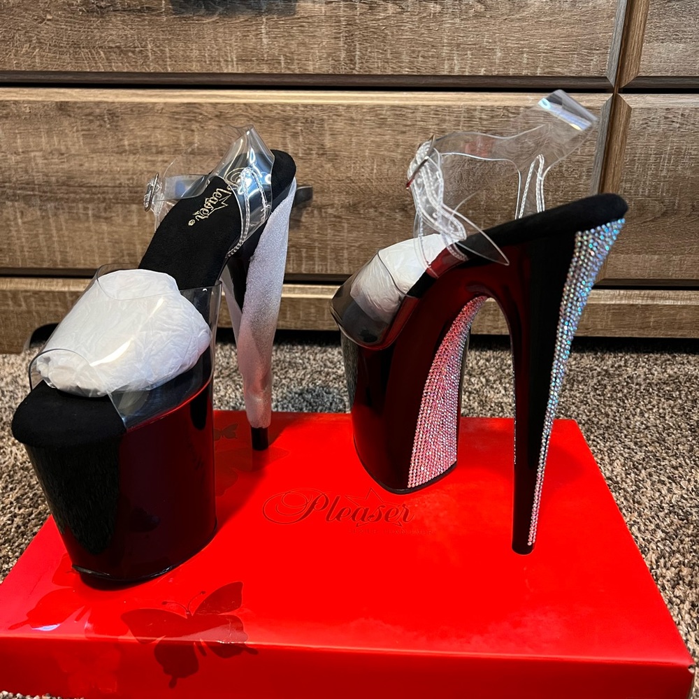 Pleaser 8” heel, 4” platform, ankle strap.
